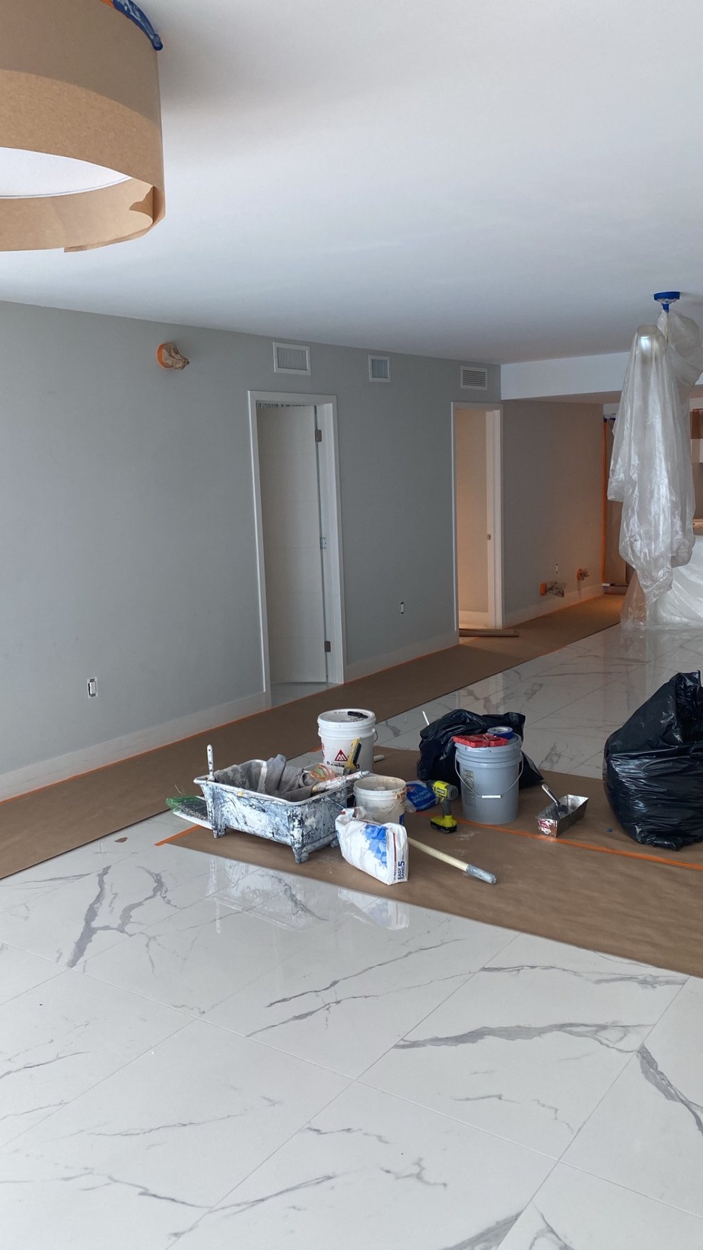 Interior painting materials and protected flooring